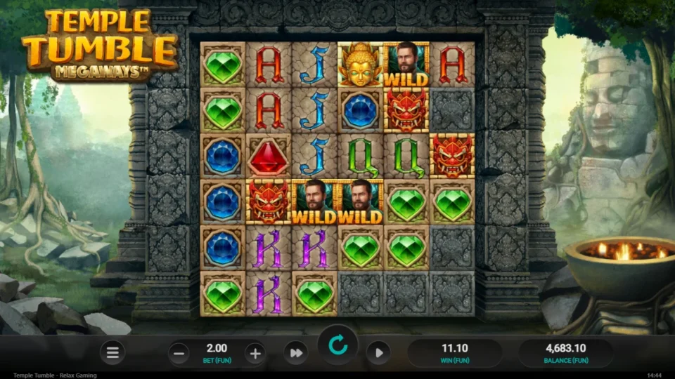 Temple Tumble: FUN 11.10 with Explorer Wild symbols visible on the settled grid