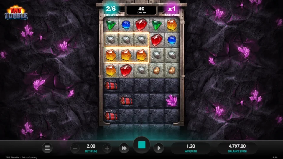 TNT Tumble: Free spins under way on media spin 180: spin 2 of 6, x1 on the meter, 40 collected with three TNT sticks in the wall
