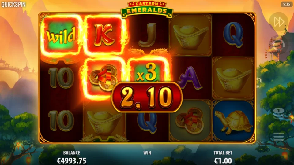 Eastern Emeralds: Wild, K, coins and an x3 Wild on reel 4 light a line worth EUR 2.10 mid-count