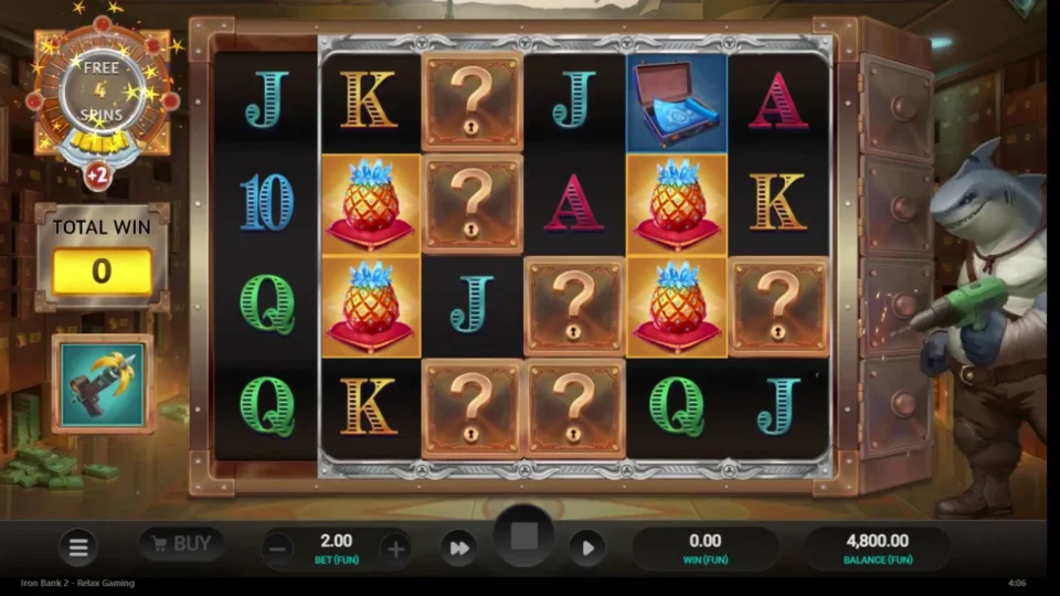 Iron Bank 2: Mystery boxes and four framed pineapples with four free spins left and the total still at 0