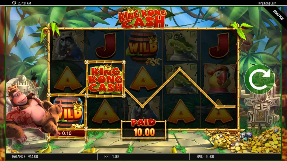 King Kong Cash: Aces on all five reels while a Wild barrel and the crowned logo outline a 0.10 line and PAID shows 10.00