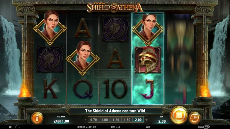 Rich Wilde and the Shield of Athena: Three Cat Wilde Scatters land on reels 1, 2 and 4 while reel 5 still spins