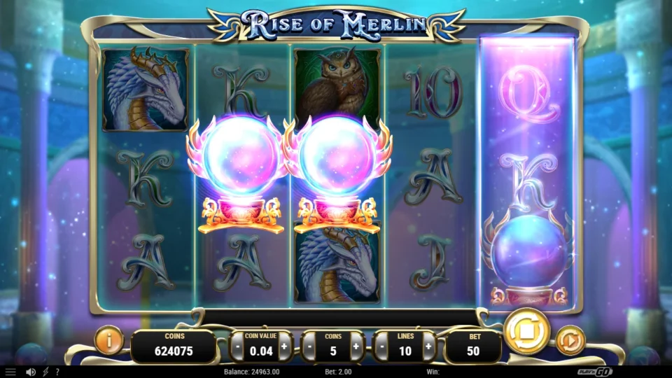 Rise of Merlin: Two Crystal Balls glow on reels two and three while a third drops onto reel five
