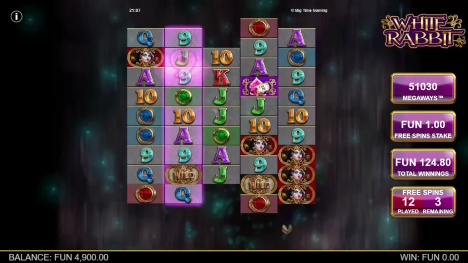 White Rabbit: A Cupcake sits on reel 4 while the enlarged reel 2 glows; the counter shows 12 spins played and three remaining.